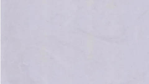 Giada Bianca engineered marble: milky cool white with faint diagonal shadow veins