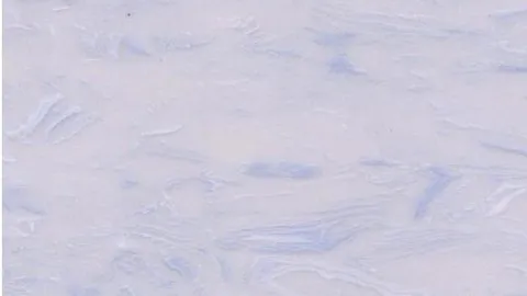 Giada Blu engineered marble: white ground with pale blue streaks sweeping horizontally