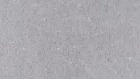 Nebbia Grigia engineered marble: mid grey with fine misty speckle and tiny white points