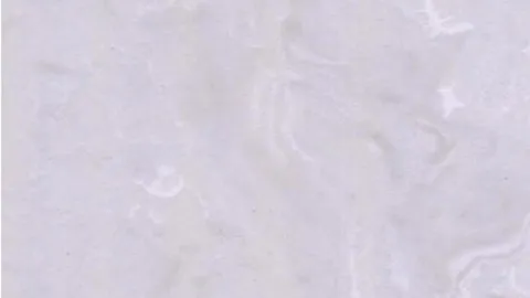 Volakas Giada engineered marble: cool white with looping brighter white swirls and pale grey drifts