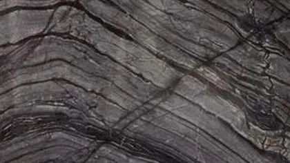 Black Forest marble: curving black and silver lines on charcoal
