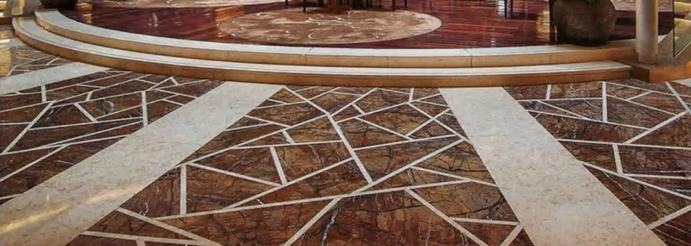 Brown, red and green marble installed