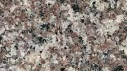 G664 granite slab: mauve-pink and grey crystals with white and black grains