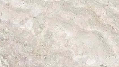 White Wood marble, cross cut: soft cream and pale grey clouds