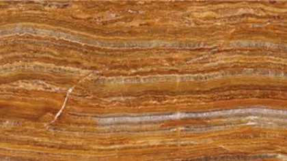 Wood Grain Onyx slab: tight amber and toffee layers like timber grain