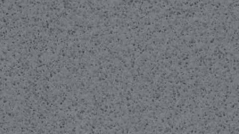 Antracite quartz slab: mid grey densely peppered with charcoal specks
