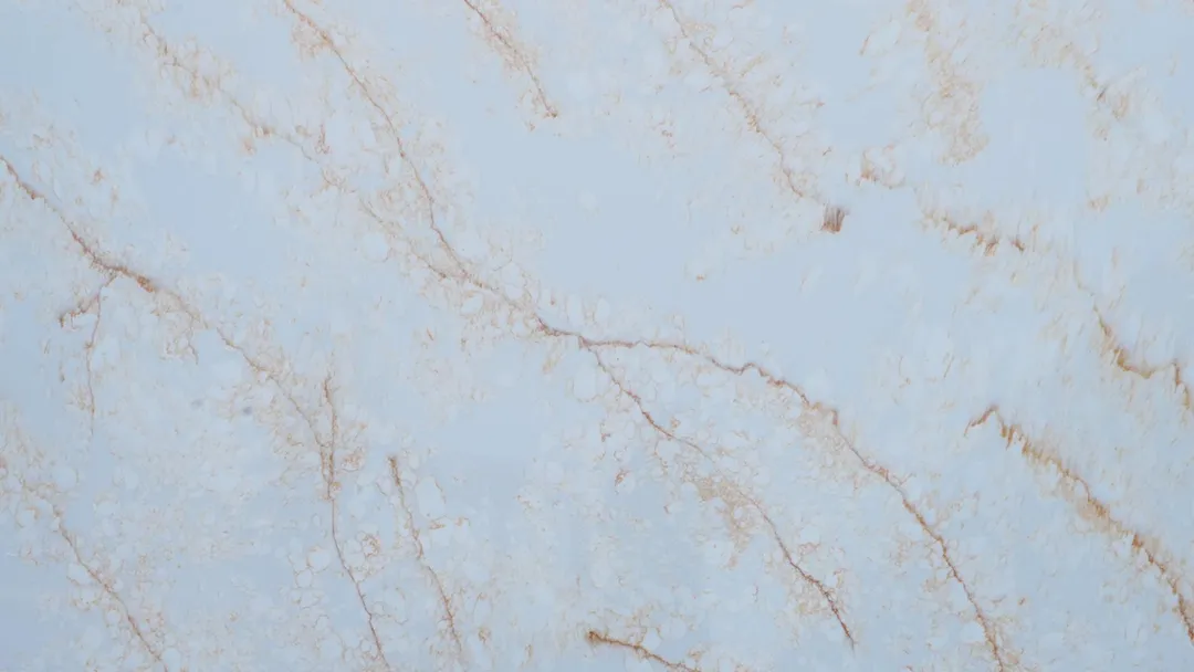 Azzurra quartz slab: rust-coloured veins on a sky-blue ground
