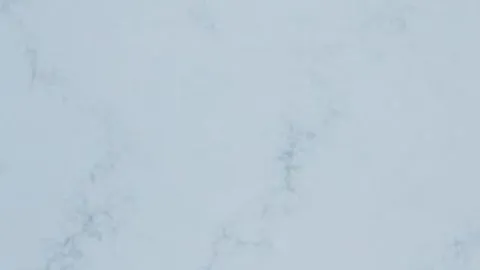 Azzurro Chiaro quartz slab: misty pale ice blue with faint feathery grey-blue veins
