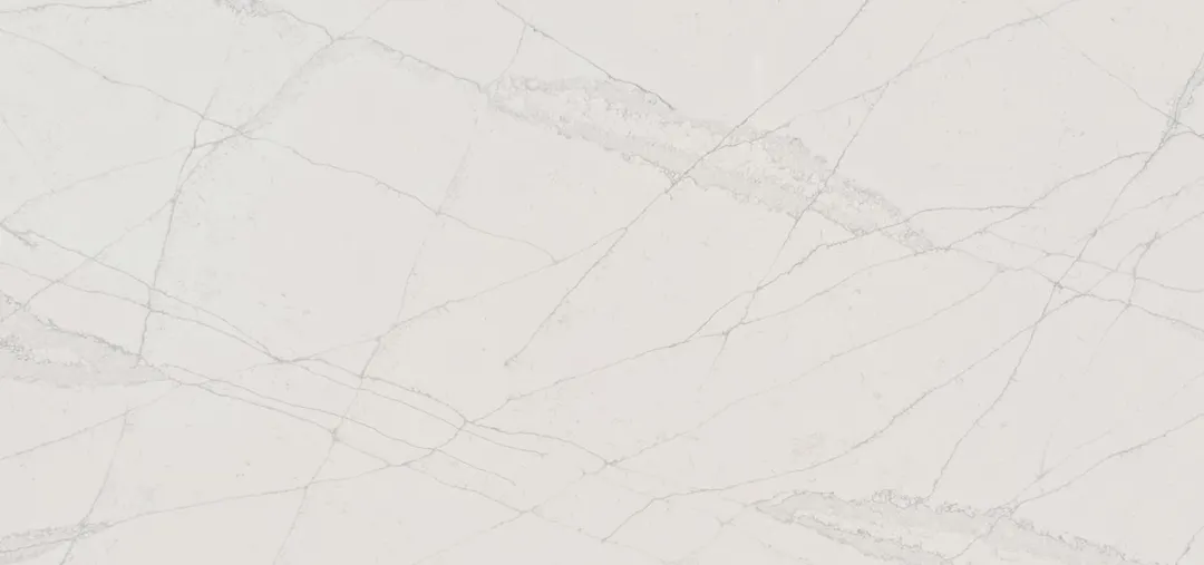 Calacatta Avorio quartz slab: fine greige veins crossing a warm ivory ground