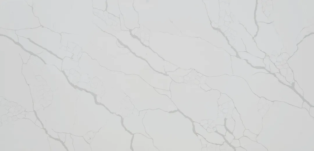 Calacatta Classico quartz slab: soft grey veins with small cloud-like breaks on white