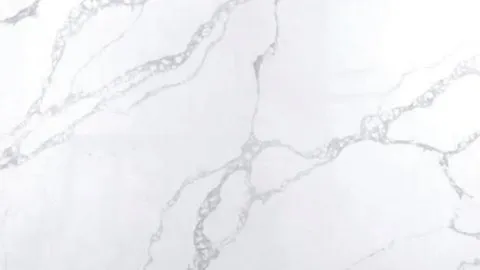 Calacatta Linea quartz slab: beaded grey veins linking in loops across white