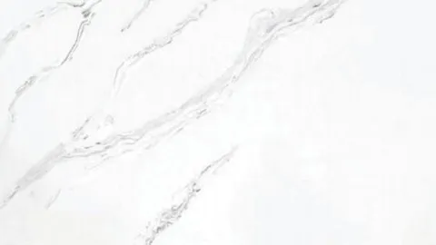 Calacatta Vento quartz slab: layered pale grey streaks sweeping upward across white