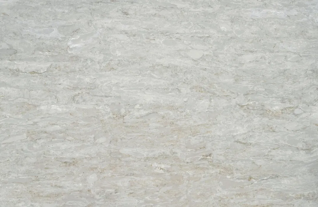 Cristallo quartz slab: layered greys and soft green with a crystalline shimmer