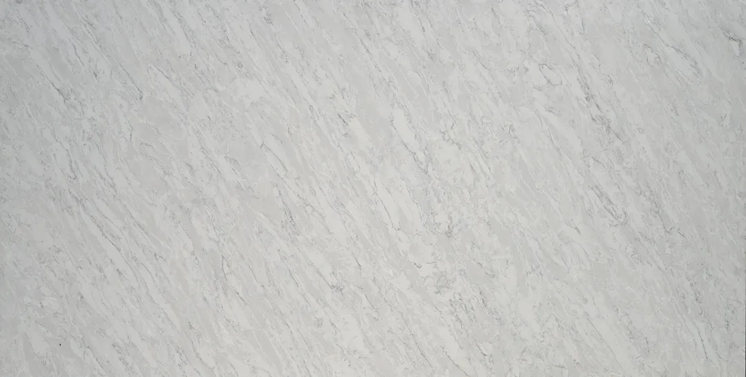 Dolomiti Seta quartz slab: fine light grey streaks running diagonally across pale grey