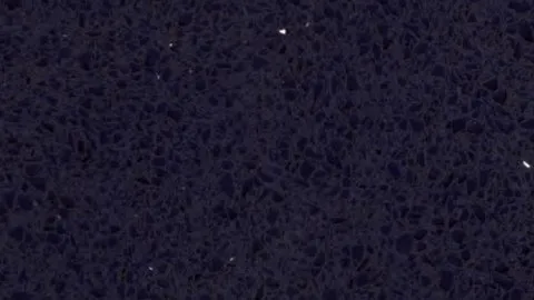 Galassia quartz slab: indigo-black with tiny bright sparkling flecks