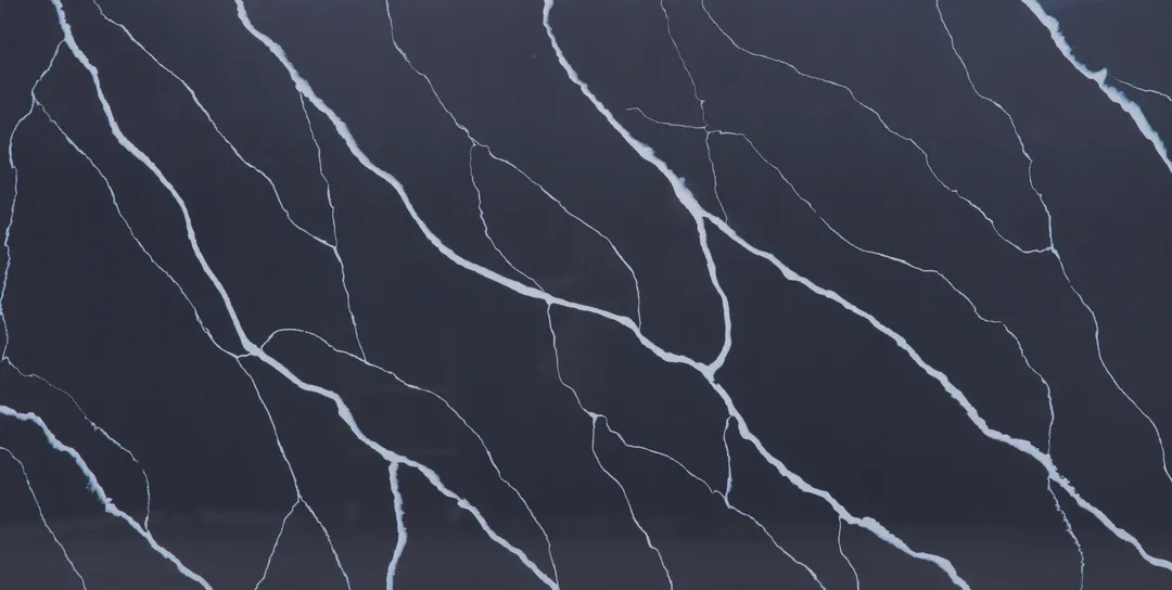 Nero Venato quartz slab: bold, flowing white veins on black