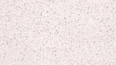Rosa Cipria quartz slab: powder pink densely speckled with grey and white granules