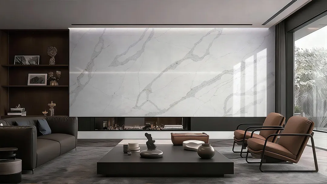 Living room with a wide Statuario Luce quartz wall above a linear fireplace