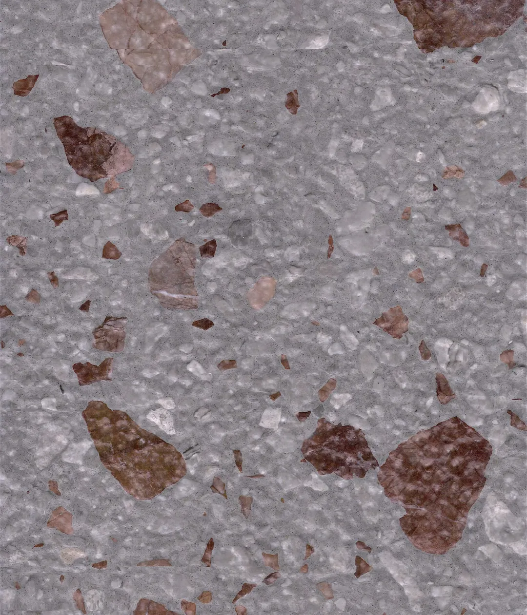 Burano Rosso terrazzo slab: large porphyry-red stones scattered across grey