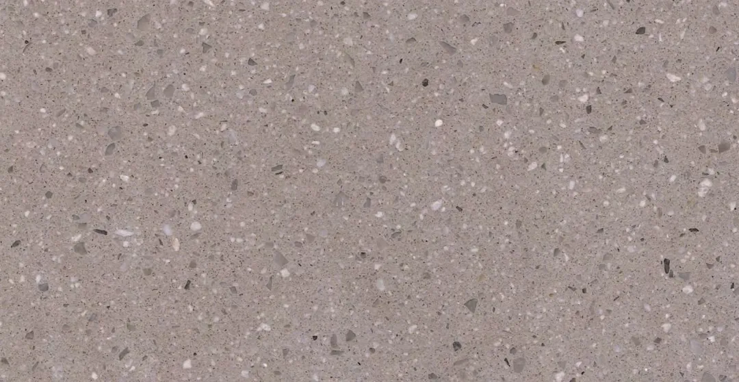 Perla Avorio terrazzo slab: warm grey ground scattered with small white and grey chips