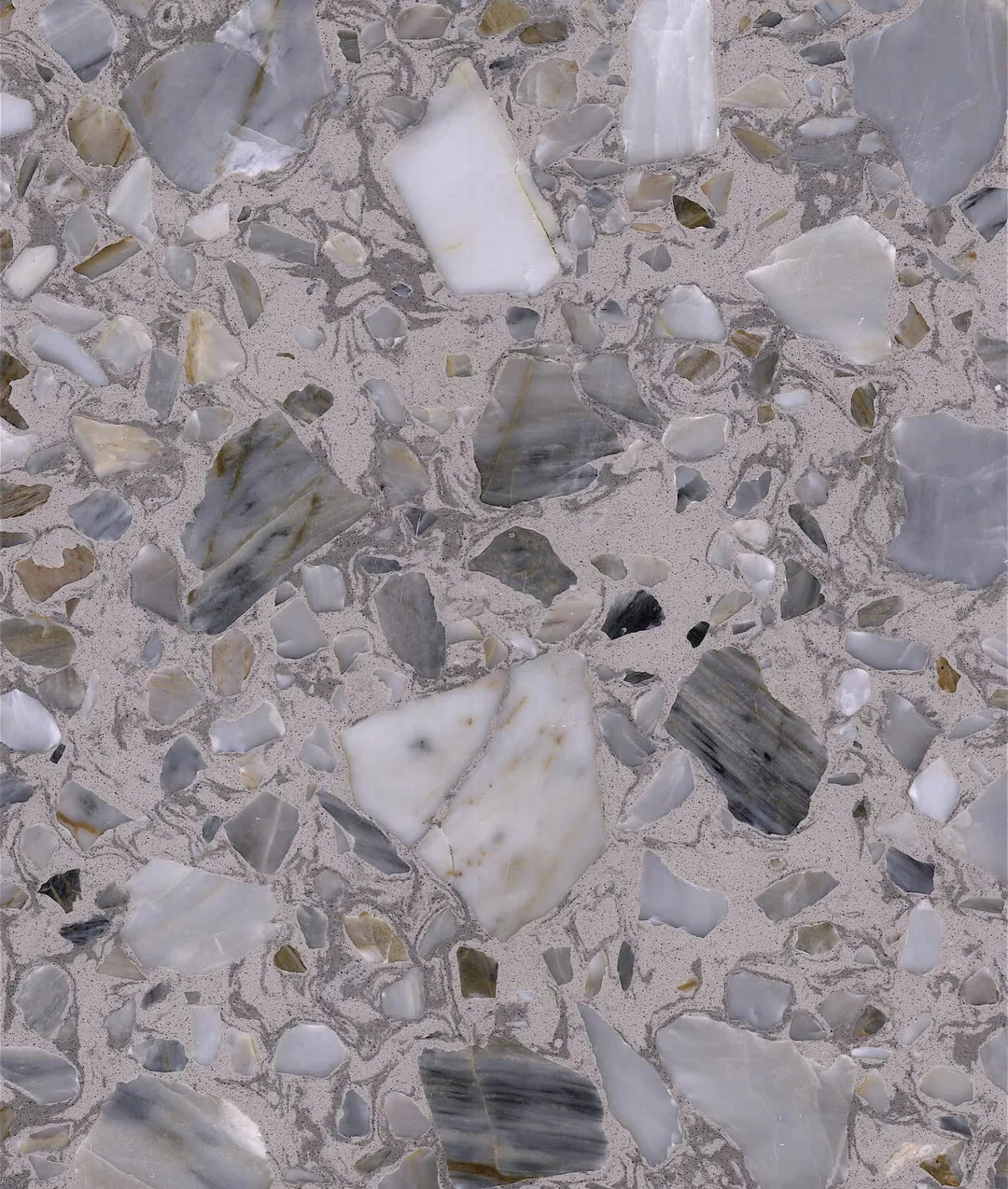 Rialto terrazzo slab: large mixed stones in blue-grey and white on a pale grey ground